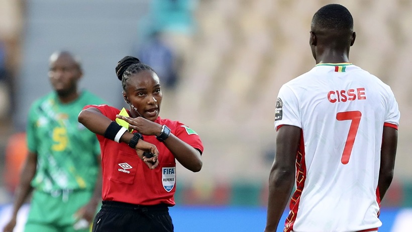 Referee_Salima_Rhadia_Mukansanga_of_Rwanda_talks_to_Ibrahima_Cisse_of_Guinea.jpeg